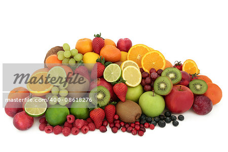 Large healthy fresh fruit selection over white background. High in antioxidants, vitamins, anthocyanins and dietary fiber.