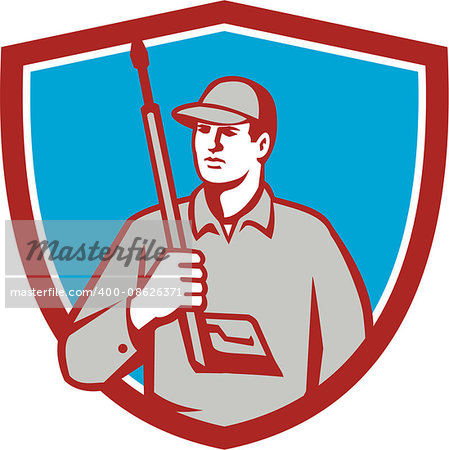 Illustration of power washer worker holding pressure washing gun on shoulder looking to the side viewed from front set inside shield crest on isolated background done in retro style.