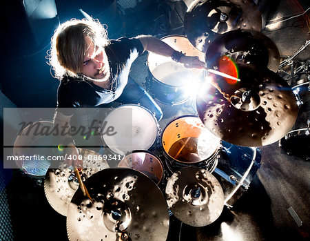 Man playing the drum.Live music background concept.Drummer and rock music