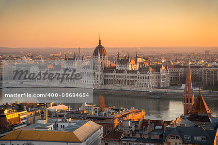 Illuminated Hungarian Parliament Building in Budapest, Hungary at Sunrise Illuminated Hungarian Parliament Building in Budapest, Hungary at Sunrise