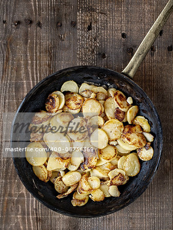 close up of rustic german bratkartofflen fried potatoes close up of rustic german bratkartofflen fried potatoes