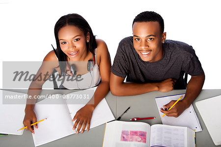 Two happy smiling academic students studying together, on white.