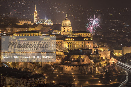 Buda Castle or Royal Palace in Budapest, Hungary with Fireworks at Night