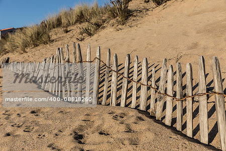 Fence on the beach of la Mine in Jard-sur-Mer (Vendee, France)