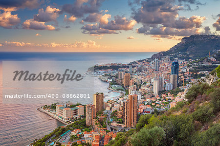 Cityscape image of Monte Carlo, Monaco during summer sunset.