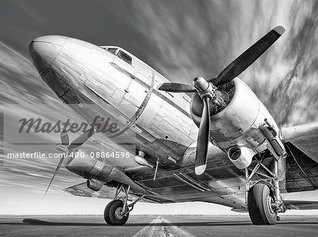 historic airplane on a runway