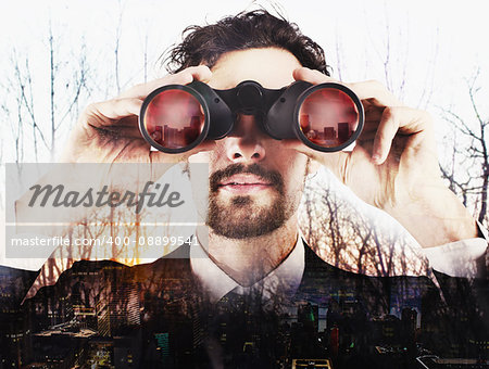 Businessman looking out from a forest the city. Looking to the future concept