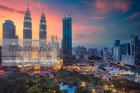 Cityscape image of Kuala Lumpur, Malaysia during sunset.