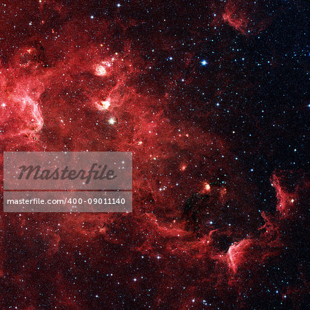 The North America nebula is an emission nebula in the constellation Cygnus, close to Deneb. Infrared view from NASA's Spitzer Space Telescope. Retouched image. Elements of this image furnished by NASA