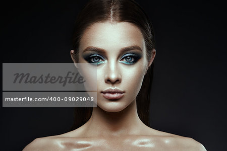 Fashion model Woman with fantasy make up. Long blowing brown hair. Fantasy Girl. Mermaid.