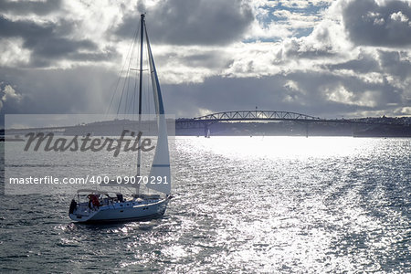 Auckland bridge and city center view from the sea and sailing ship, New Zealand