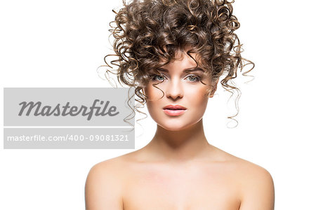 beautiful young woman with big curly hairdo. beauty shot isolated on white background.  copy space.