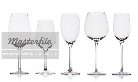 Empty wine glasses with reflection on white background with reflection