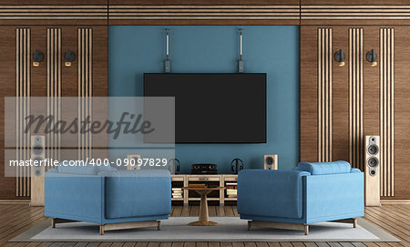 home cinema room with TV hanging on blue wall ,armchairs and wooden decorations - 3d rendering