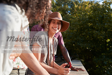 Group Of Tourists Taking Photos On Mobile Phones