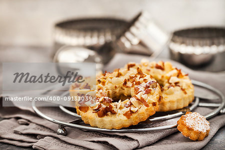 Ring shortbread cookies with peanuts on top