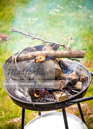 Barbecue in garden. Fire for BBQ grill