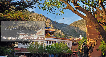 Medina in Chefchaouen in the afternoon with the Rif Mountain.