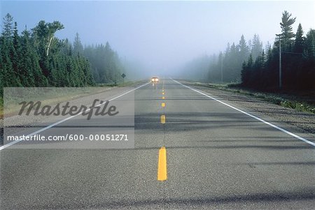 Car on Road with Haze Highway 17, Ontario, Canada