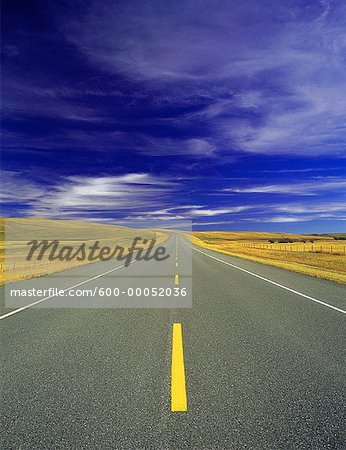 Highway and Clouds Alberta, Canada