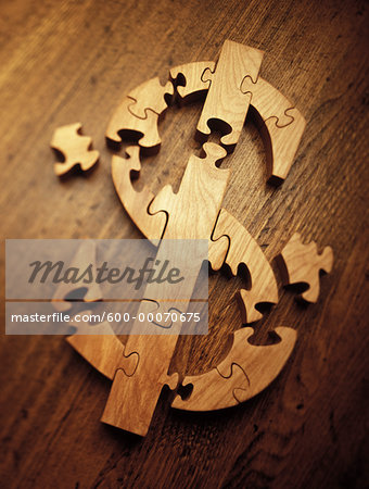 Wooden Jigsaw Puzzle Forming Dollar Sign Wooden Jigsaw Puzzle Forming Dollar Sign