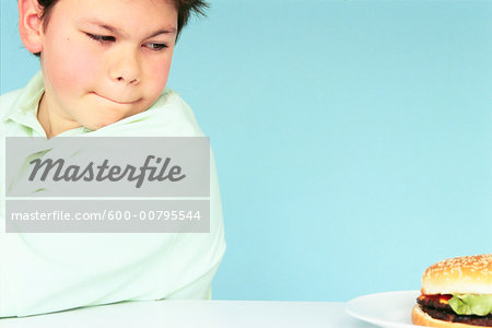 Portrait of Boy with Hamburger