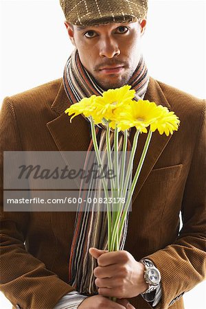 Portrait of Man Holding Flowers