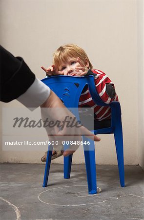 Boy Looking at Angry Parent