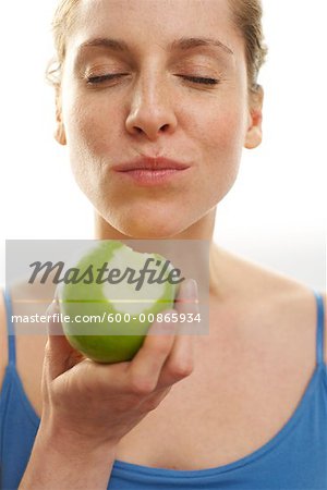 Woman Enjoying Apple