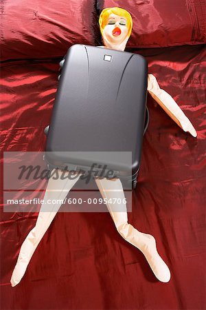 Blow Up Doll in Suitcase Stock Photo Masterfile Premium