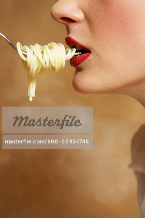 Woman Being Fed Pasta