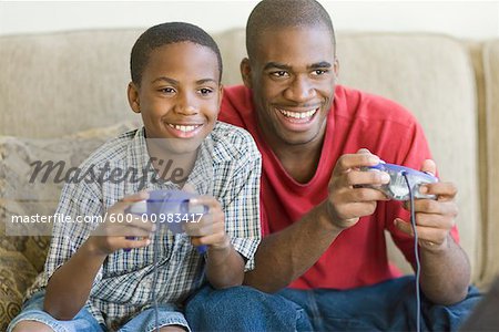 Brothers Playing Video Game