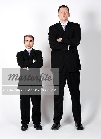 Short and Tall Businessmen - Stock Photo - Masterfile - Premium  Royalty-Free, Artist: Masterfile, Code: 600-00983731
