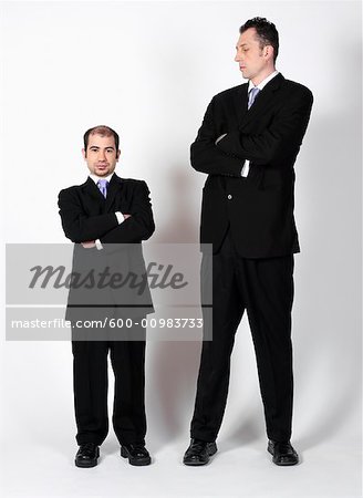 Short and Tall Businessmen