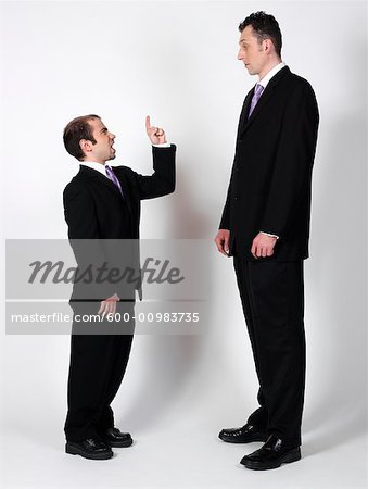 Short and Tall Businessmen - Stock Photo - Masterfile - Premium  Royalty-Free, Artist: Masterfile, Code: 600-00983735