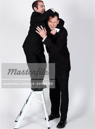 Short and Tall Businessmen - Stock Photo - Masterfile - Premium  Royalty-Free, Artist: Masterfile, Code: 600-00983739