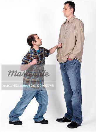 Short and Tall Man - Stock Photo - Masterfile - Premium Royalty