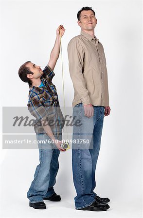 Tall man short man standing hi-res stock photography and images - Alamy