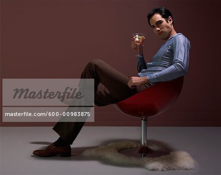 Man Drinking from Thermos on Beach - Stock Photo - Masterfile -  Rights-Managed, Artist: Masterfile, Code: 700-00606349