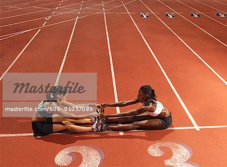 Women Stretching on Track