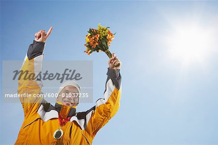 Man with Medal Holding Bouquet