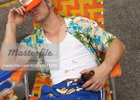 Messy Man Sleeping in Lawnchair