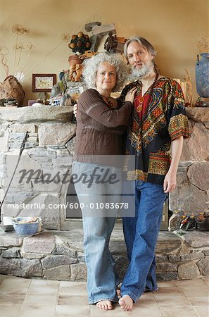 Hippie Couple in Front of Fireplace