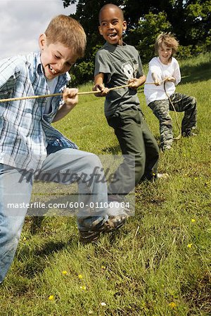 Boys Playing Tug Of War Stock Photo Masterfile Premium Royalty Free Artist Masterfile Code 600