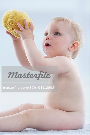 Baby Holding Sponge