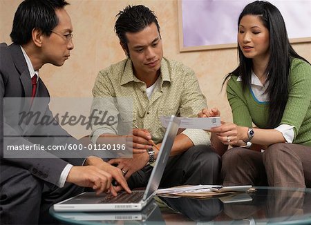 Man and Woman Meeting with Accountant