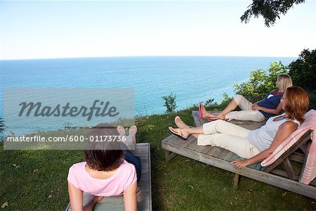 Women Sitting Outdoors