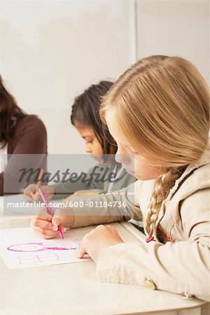 Students Drawing in Classroom