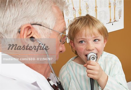 Boy Playing with Doctor's Stethoscope