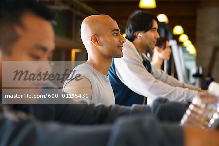 People Exercising in Gym